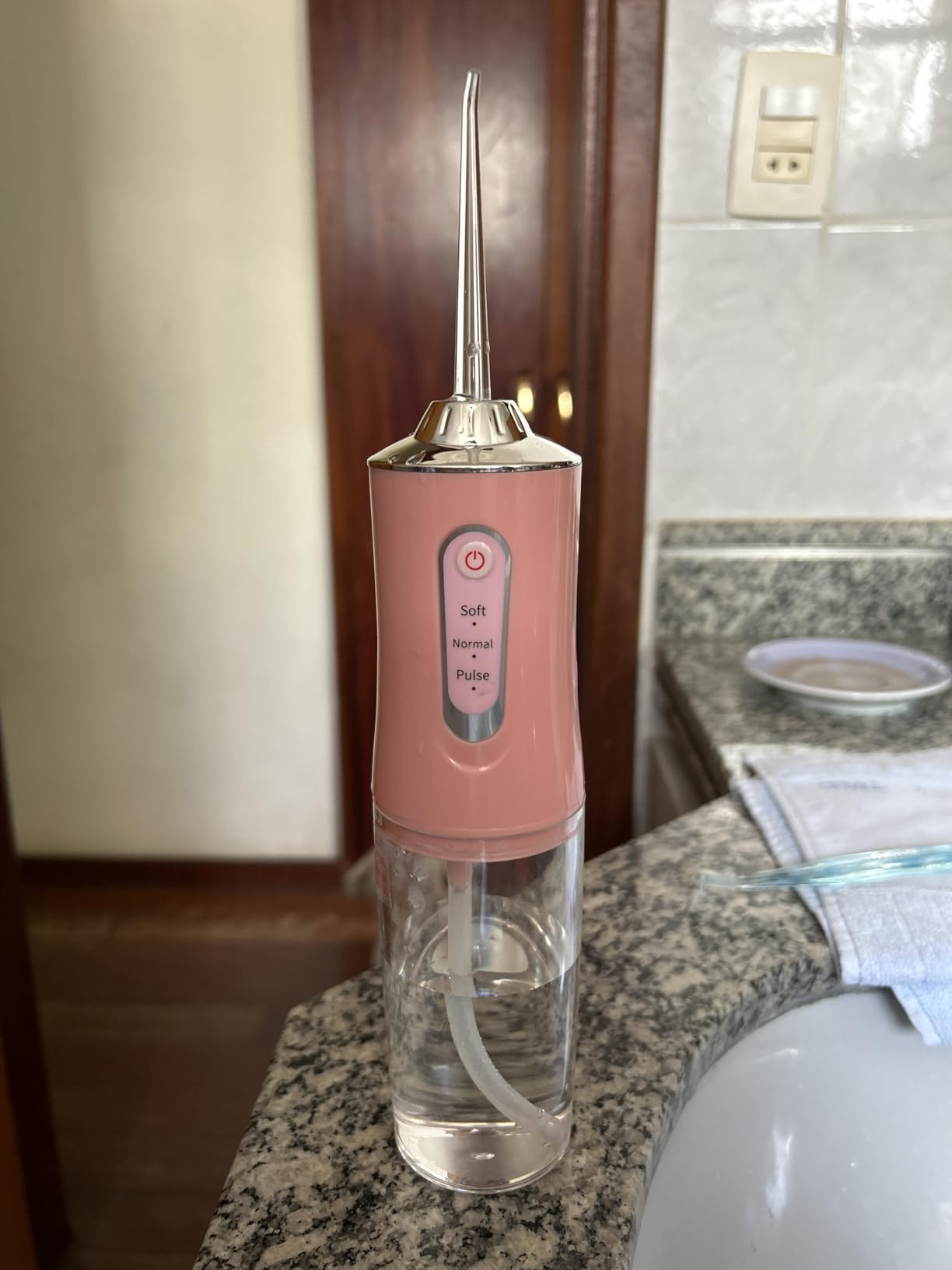 Print real de cliente sobre o irrigador oral portátil